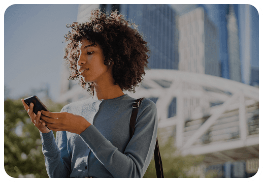 Woman checking her StelWallet on her phone